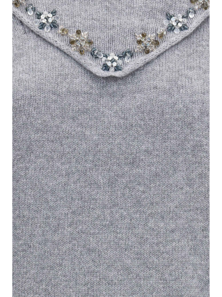 Sweater with integrated scarf