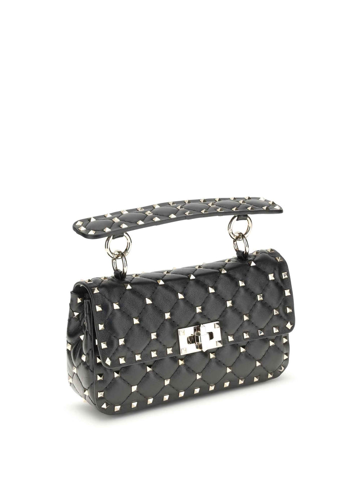 Rockstud Spike mini Top Handle Bag in nappa