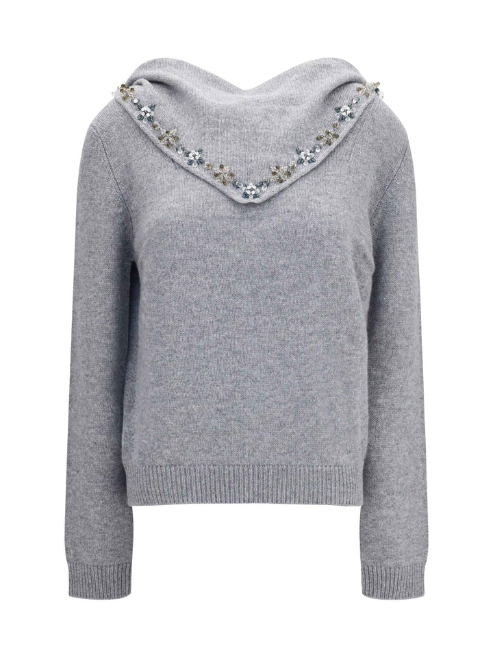 Sweater with integrated scarf