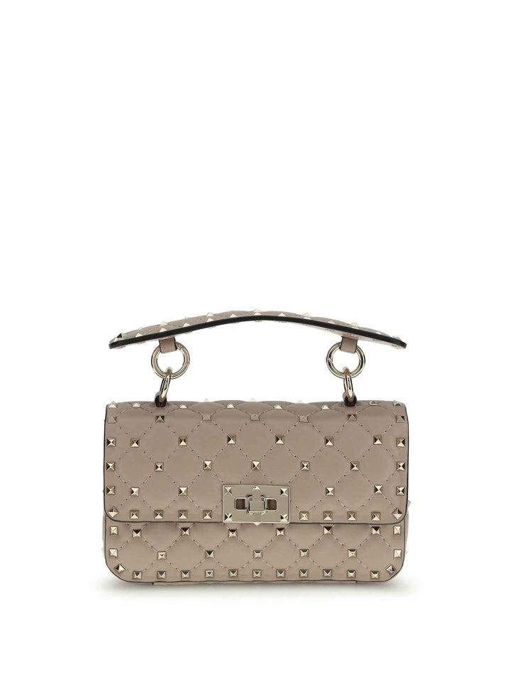 Rockstud Spike mini Top Handle Bag in nappa