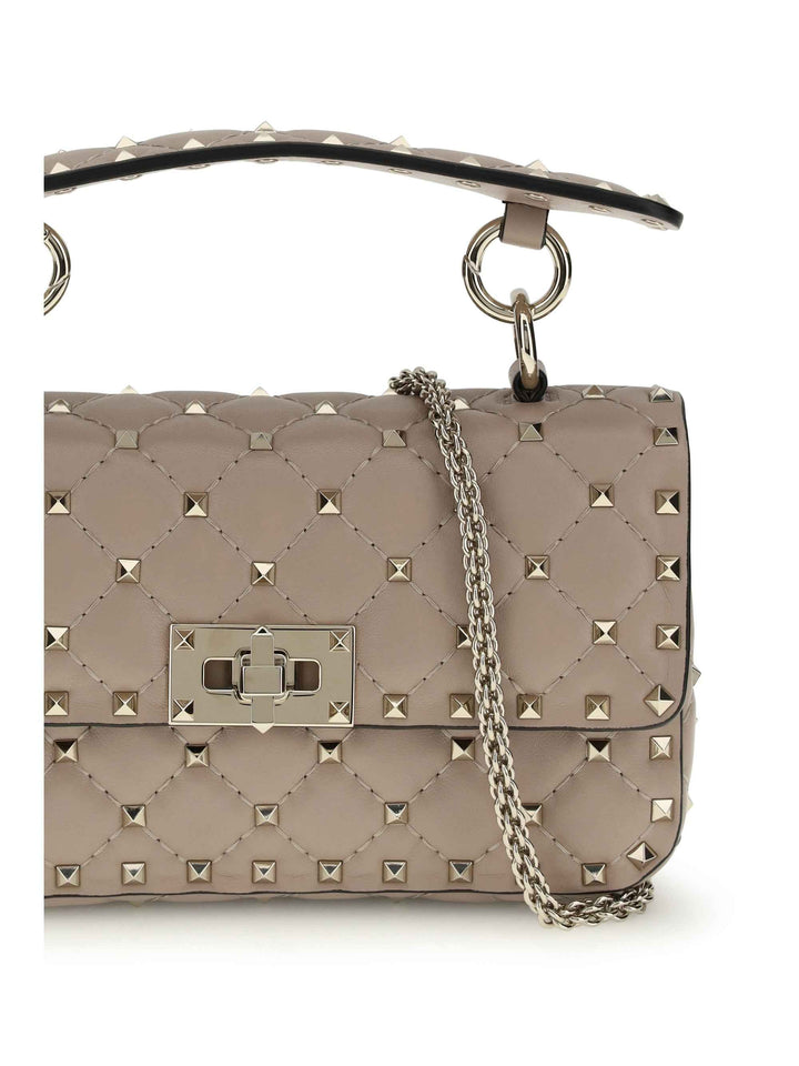 Rockstud Spike mini Top Handle Bag in nappa